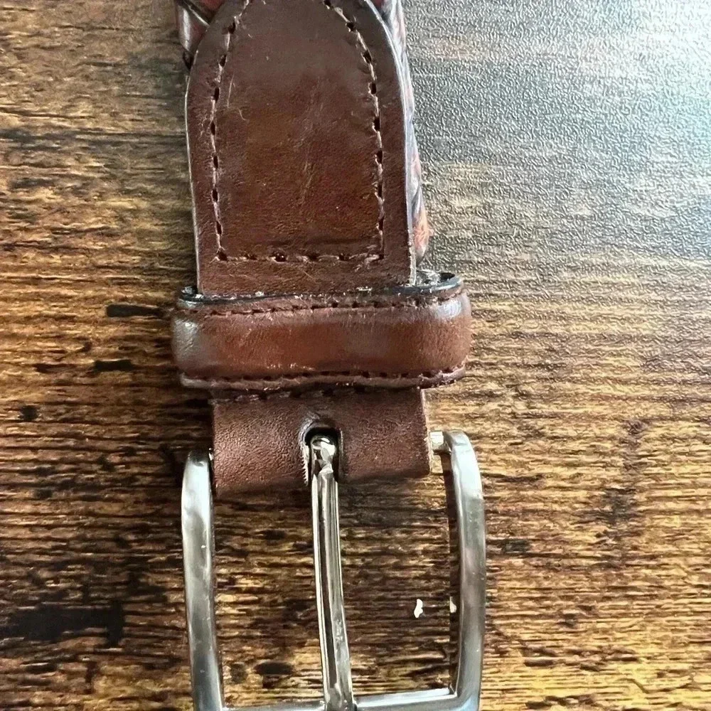 Mens brown woven belt with silver buckle
